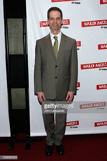 Patrick Breen standing on Tint of Hillary coat on 25th Anniversary GAla of Naked Angels